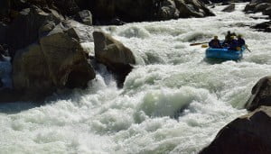 Raft at top of Mushroom Rapid on Class V Cherry Creek